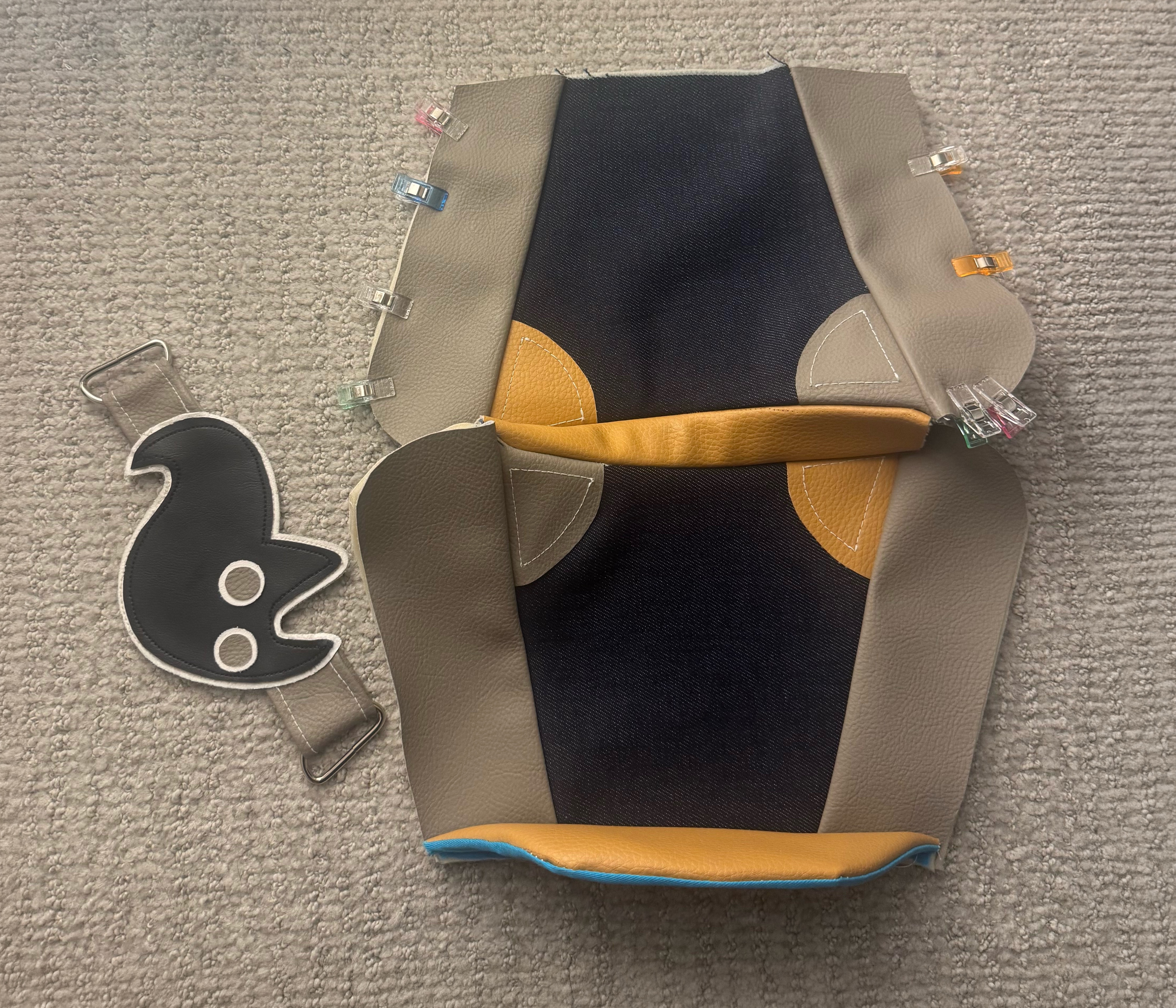 Assembly with clips and ghostcat patch