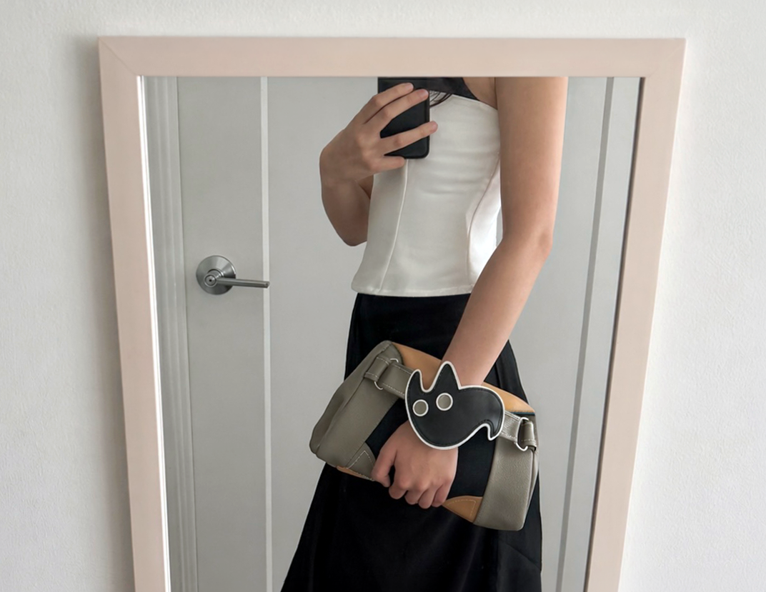 Finished Ghostcat Clutch held